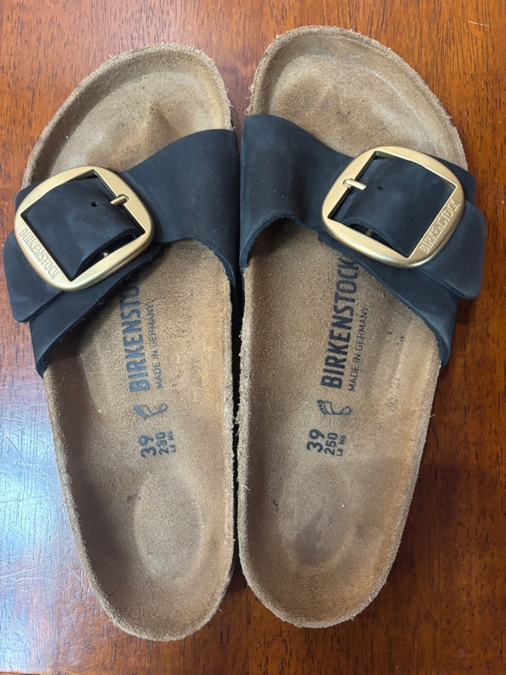 Birkenstock Black Slide Sandals with Gold Buckles